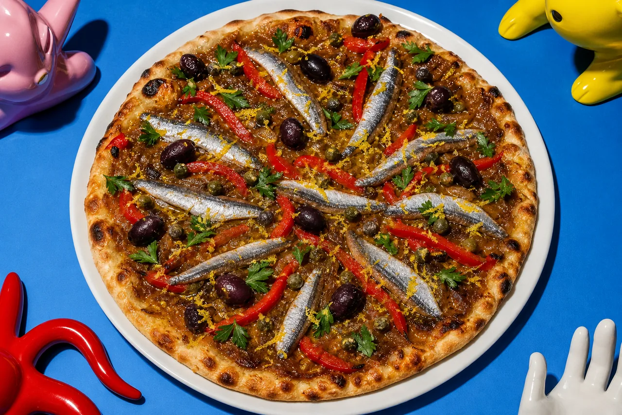 Pissaladière de chef aux anchois frais, oignons confits et olives noires